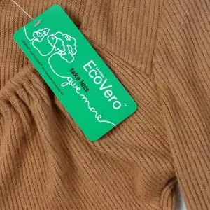 Lenzing Viscose women’s long sleeve rib brushed knotted collar crop top