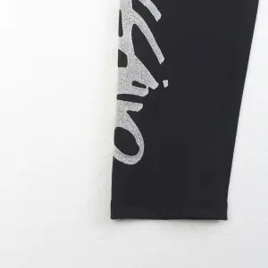 Women’s glitter logo print solid basic legging